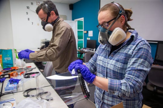 Answering hospitals' calls for face shields to protect against coronavirus, Iowa makers begin 3D printing parts