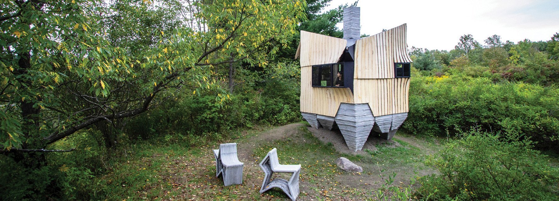 HANNAH transforms wood considered as waste into this 3D-printed cabin